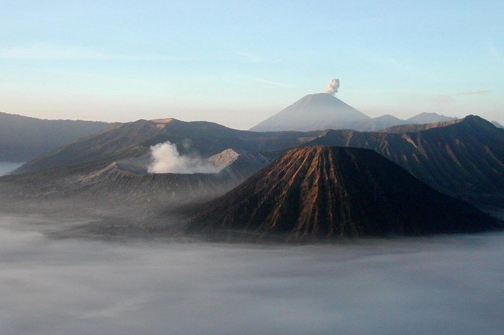 The Tengger sand sea with the smoking cone of Bromo The Tengger sand sea with the smoking cone of Bromo