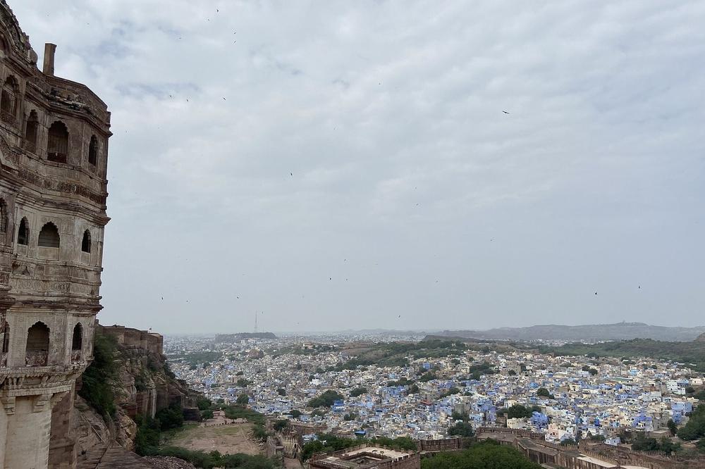 Blue-washed houses below a hill fort in Rajasthan Blue-washed houses below a hill fort in Rajasthan