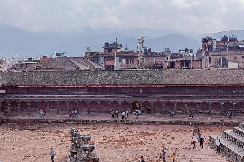 Carved timber windows above brick facades on the palace square at Bhaktapur Carved timber windows above brick facades on the palace square at Bhaktapur