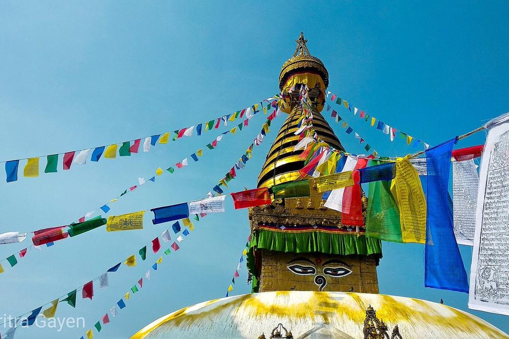 The painted eyes of the stupa at Swayambhunath above the valley The painted eyes of the stupa at Swayambhunath above the valley