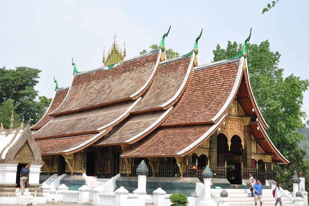 The layered roofs of Wat Xieng Thong at the end of the peninsula The layered roofs of Wat Xieng Thong at the end of the peninsula