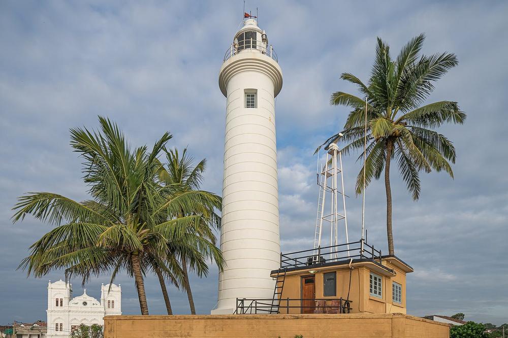 The lighthouse and sea wall inside the ramparts of Galle fort The lighthouse and sea wall inside the ramparts of Galle fort